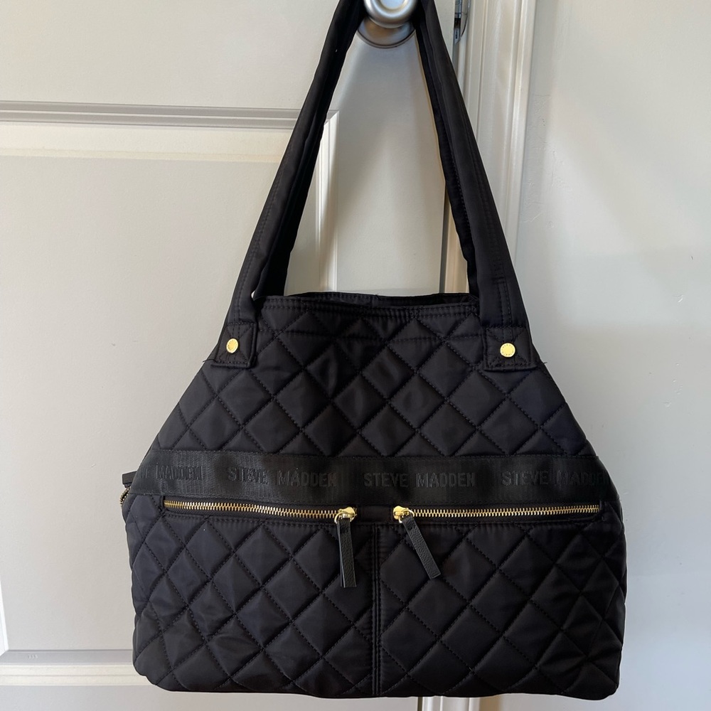 Steve Madden handbag! You could also use this as a diaper bag 😍